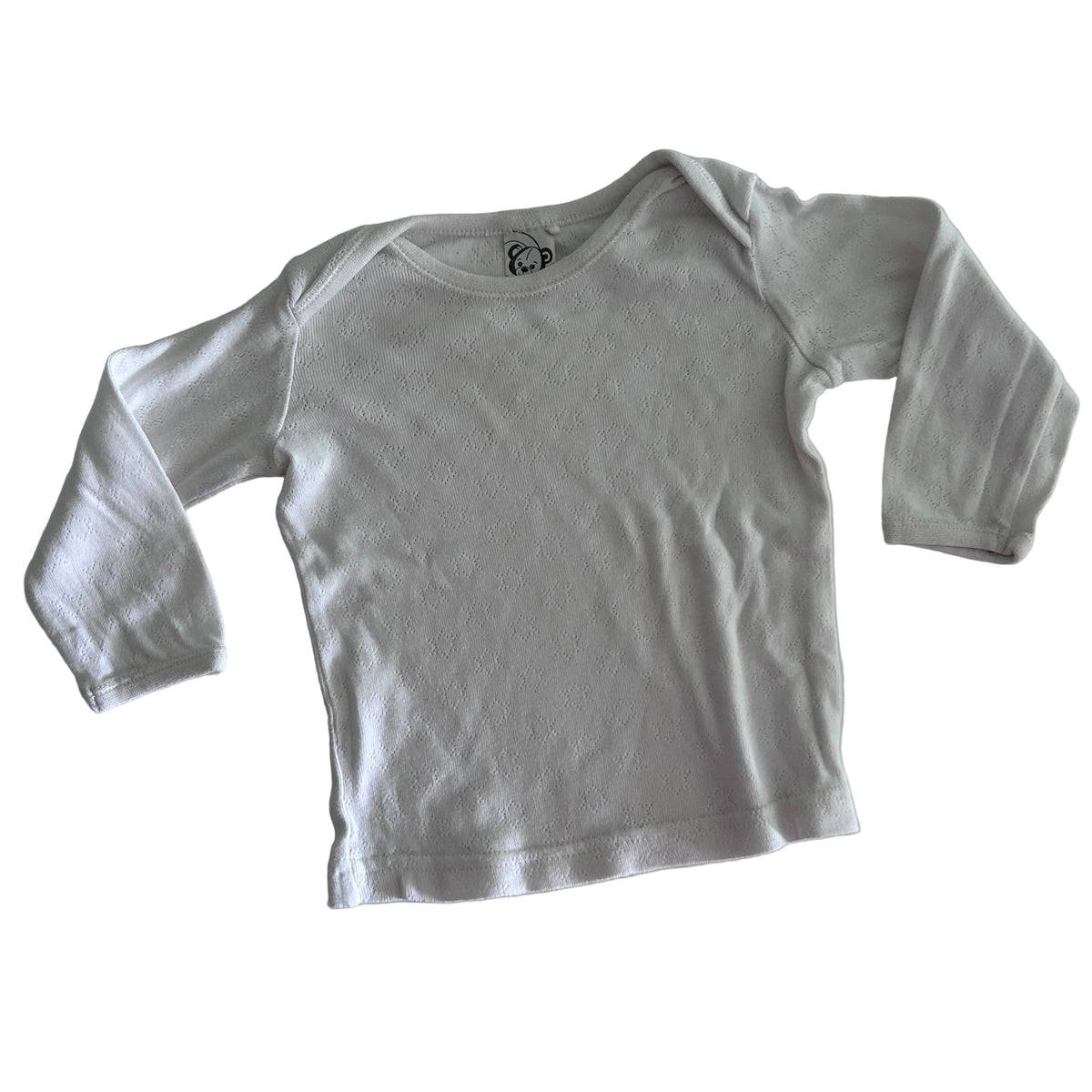Target Age 1 long sleeved top in white with textured pointelle knit fabric — gently loved condition.