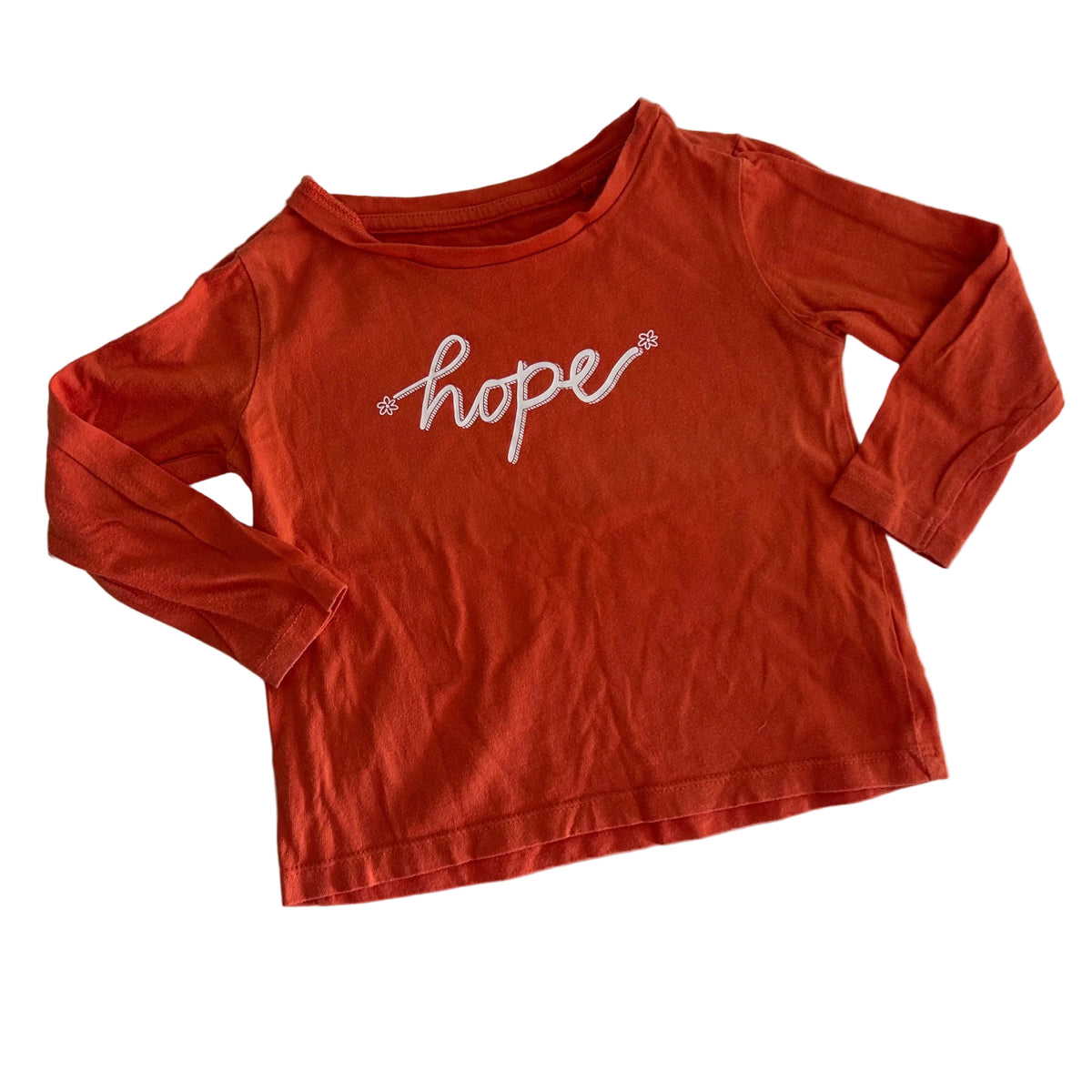 Anko Age 2 long sleeved t-shirt in orange with white cursive 'hope' text with small flower motifs — gently loved condition.