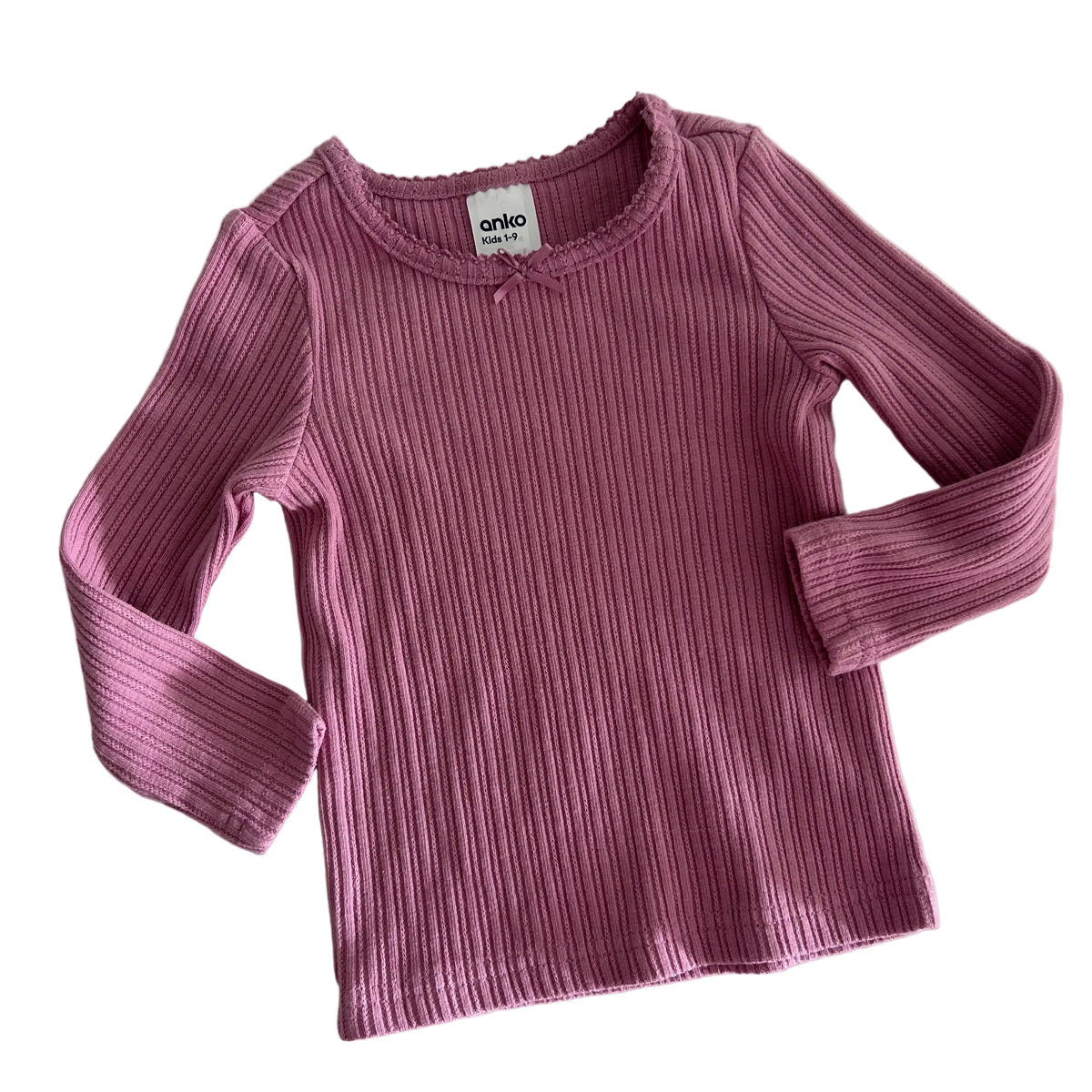 Anko Age 1 long sleeved ribbed top in pink with ribbed knit texture with lettuce edge neckline detail — like new condition.