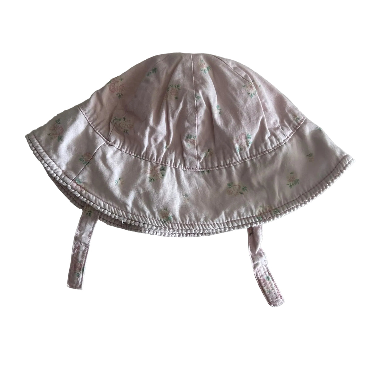 Baby Berry Age 000 sun hat with chin ties in pink with floral print, pom pom trim along brim — gently loved condition.
