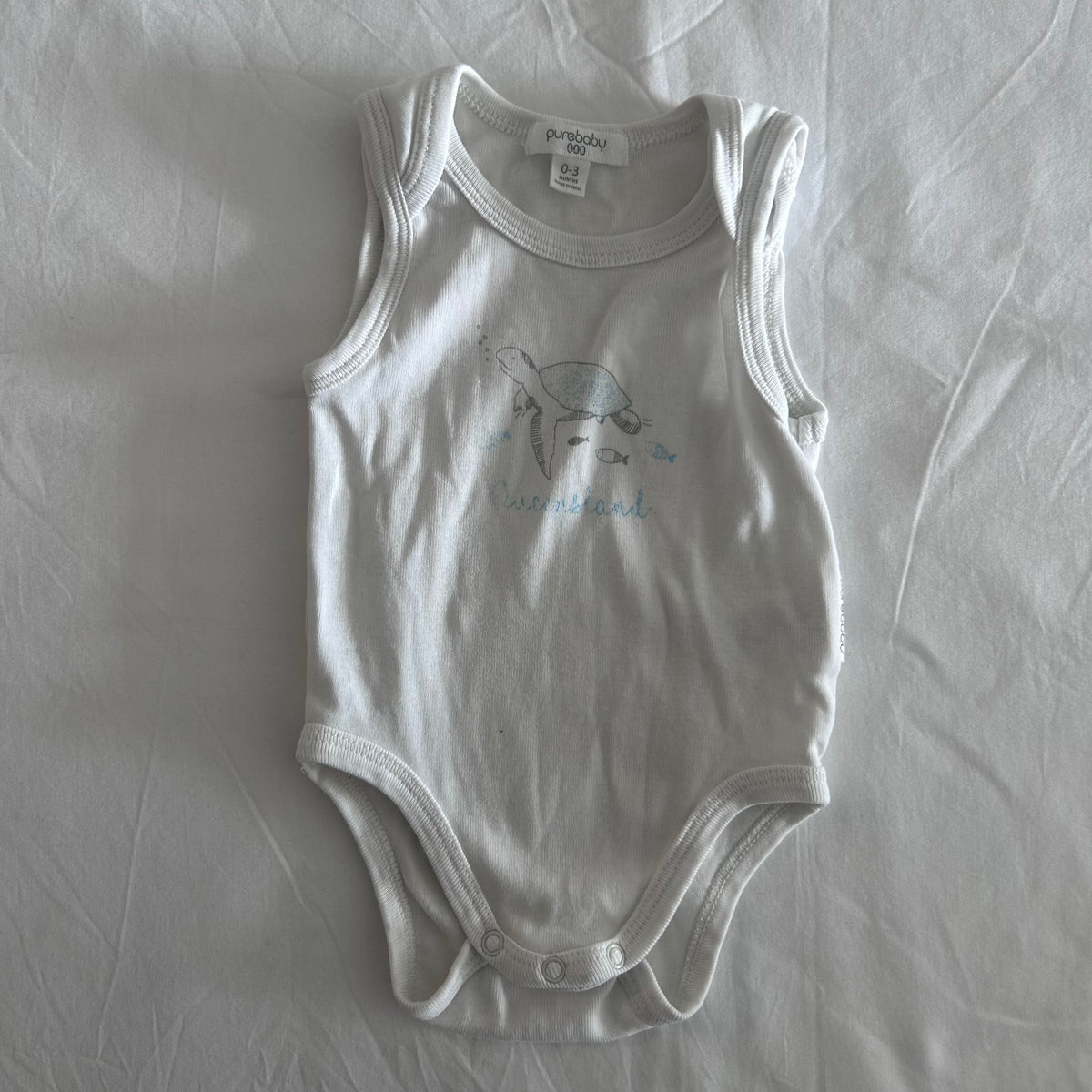 Purebaby Age 000 sleeveless bodysuit onesie in white with sea turtle and fish print with 'queensland' text — well loved condition.