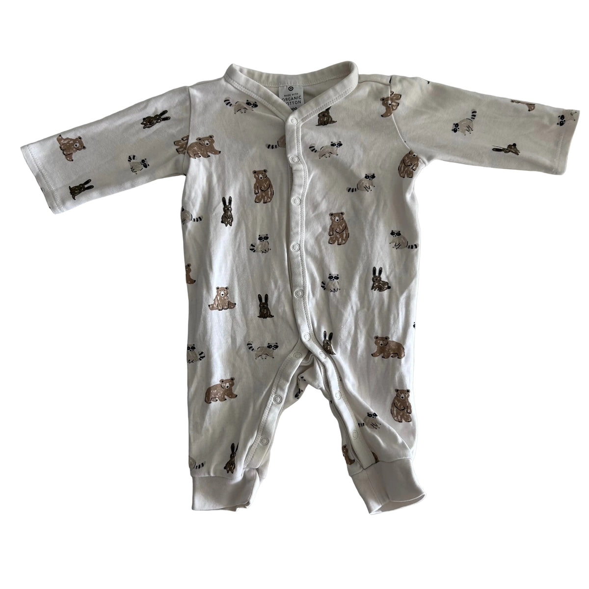 Target Age 000 long sleeve snap-front footed romper in white/cream with woodland animals allover print (bears, raccoons, rabbits) — gently loved condition.
