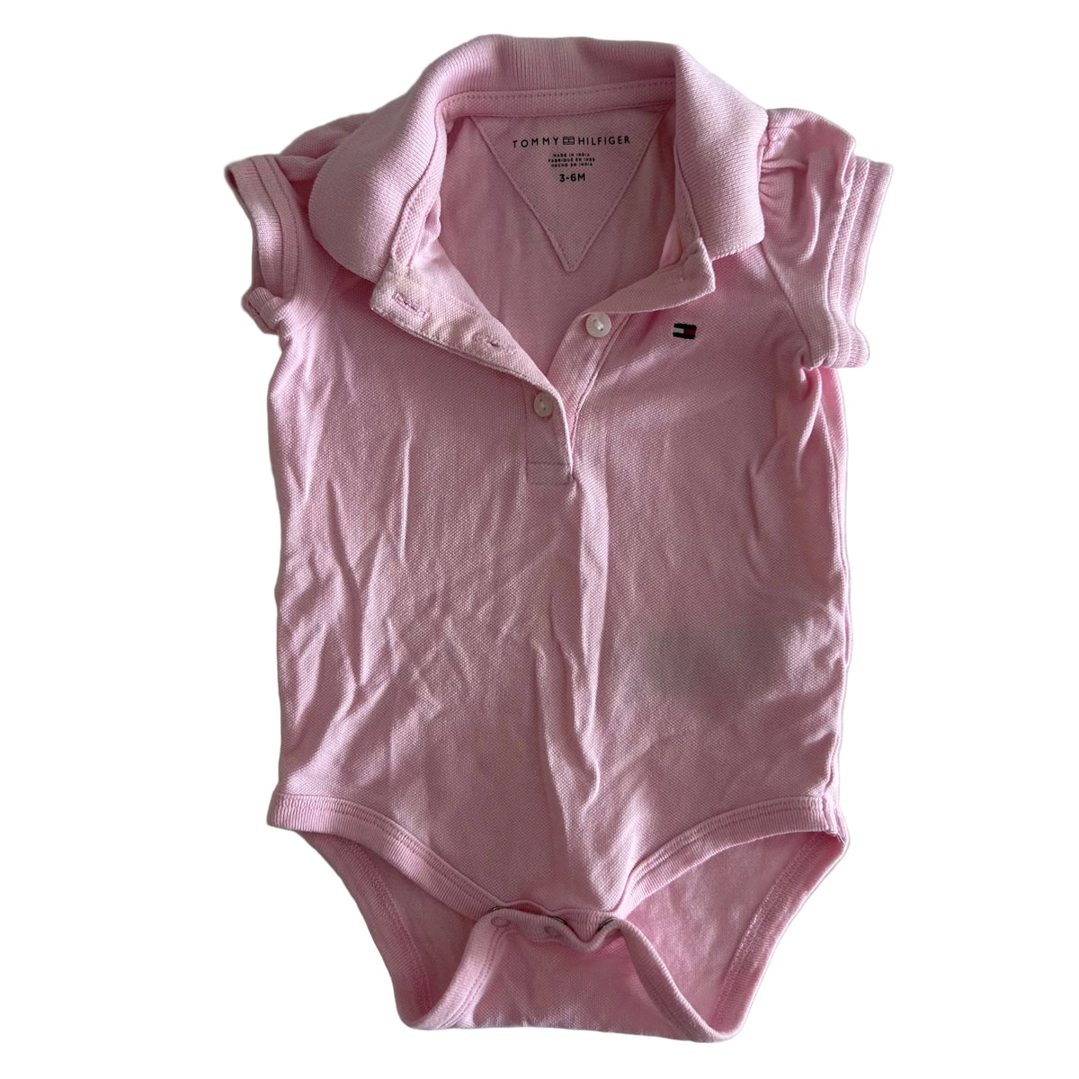Tommy Hilfiger Age 00 short sleeve polo bodysuit in pink with pique texture, small embroidered flag logo — gently loved condition.