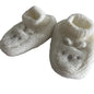Unknown 11cm knitted baby booties in cream/off-white with bunny face with embroidered eyes and nose, small knitted ears on toe — like new condition.