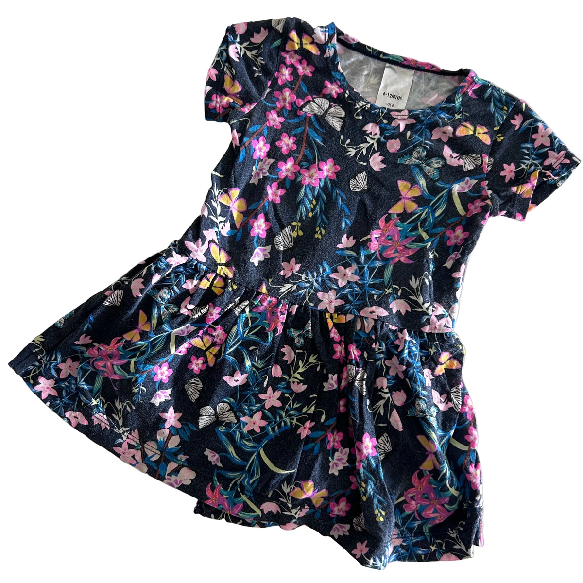 Bonds Age 0 short sleeve skater dress in navy, pink, blue, yellow, white, green with floral and butterfly print — gently loved condition.
