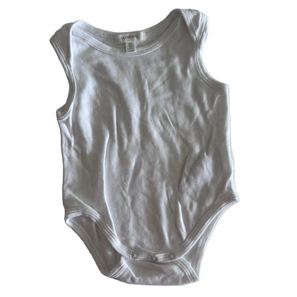 A white sleeveless baby bodysuit laid flat on a white fabric background, featuring a crew neck and three-button snap closure at the crotch.