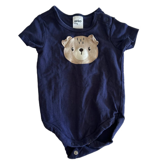 Anko Baby Age 00 short sleeve bodysuit in navy blue with embroidered bear face appliqué on chest — gently loved condition.