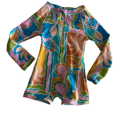 Billabong Age 1 long sleeve zip-up rashie swimsuit in blue, teal, pink, orange, yellow, green, white with abstract tropical floral and swirl print — gently loved condition.