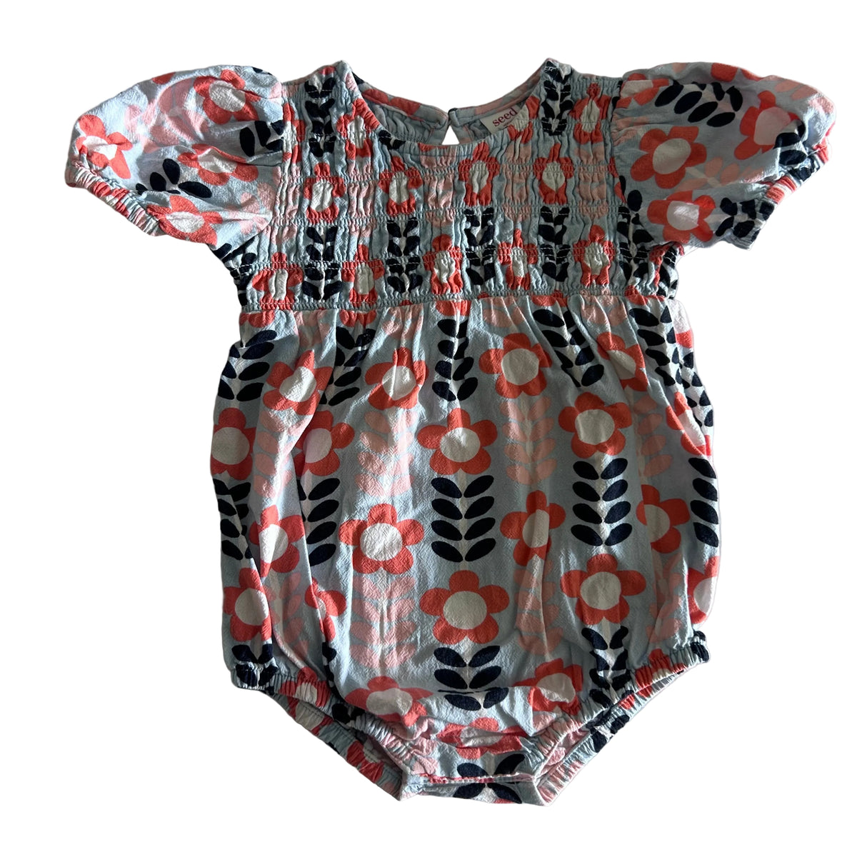 Seed Heritage Age 1 short sleeve smocked bubble bodysuit in light blue, coral/orange, navy, white with floral print with daisy flowers and leaf stems, smocked chest panel — gently loved condition.