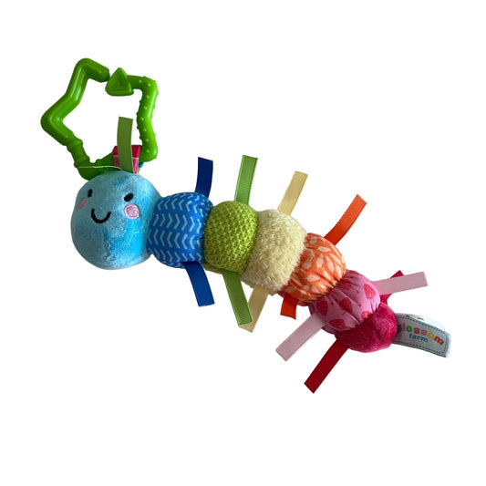 Colourful and various textures pram toy, caterpillar on plain light background.