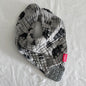 Nuby Age 00 bandana bib with silicone teether in grey, black with bears and pine trees print, reversible — gently loved condition.