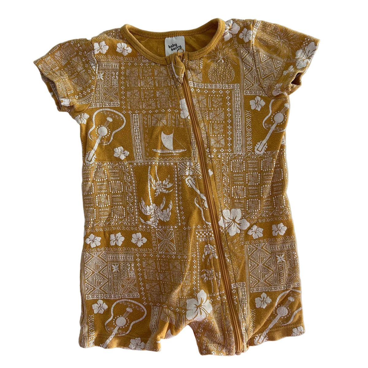 Baby Berry Age 0 short sleeve zip romper in mustard yellow and white with hawaiian tapa/tribal print with hibiscus flowers, pineapples, ukuleles, sailboats and palm trees — gently loved condition.