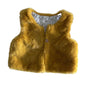 Orchestra Age 1 faux fur sleeveless gilet vest in mustard yellow with plain faux fur exterior, printed lining with black and mustard dash/raindrop pattern and small animal motifs — like new condition.