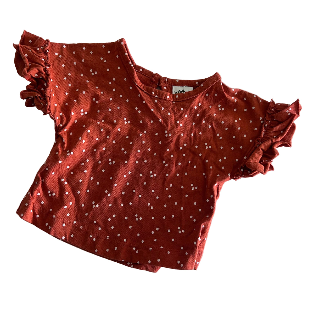 Baby Berry Age 0000 short sleeve flutter sleeve top in rust red, white with scattered polka dots, frill/ruffle sleeve trim — gently loved condition.