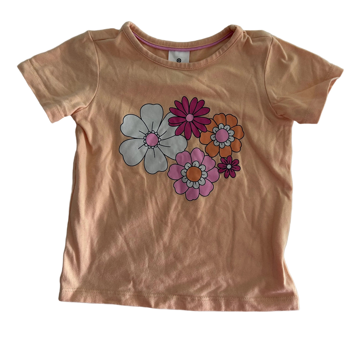 Target Age 1 short sleeve t-shirt in peach, white, pink, magenta, orange with retro floral graphic print — gently loved condition.