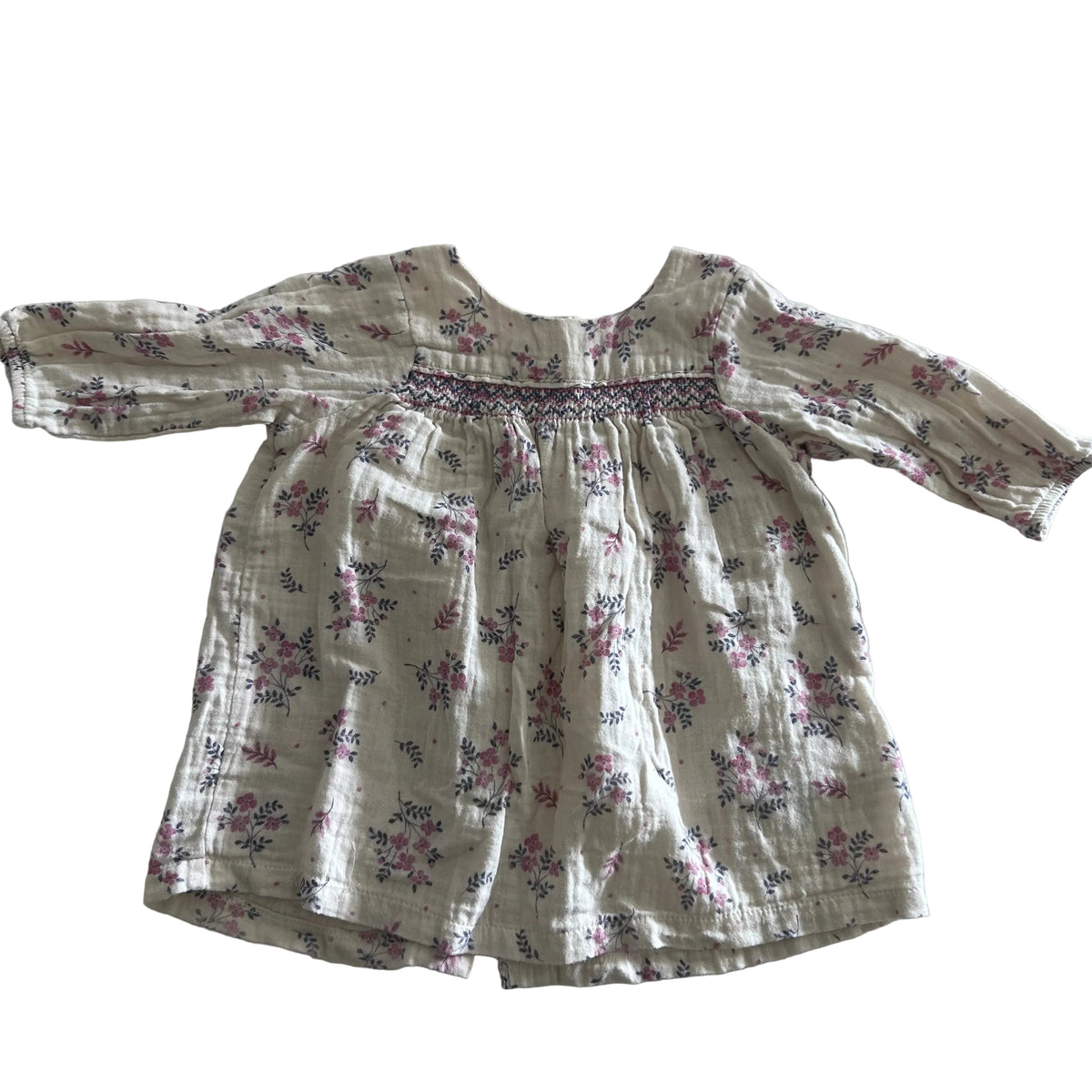 Purebaby Age 0 long sleeved smocked dress in cream, pink, navy with floral print, smocked chest panel — gently loved condition.