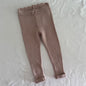Kiabi Age 2 ribbed leggings in dusty pink-beige with fine vertical rib knit with scalloped waistband and small bow detail — like new condition.