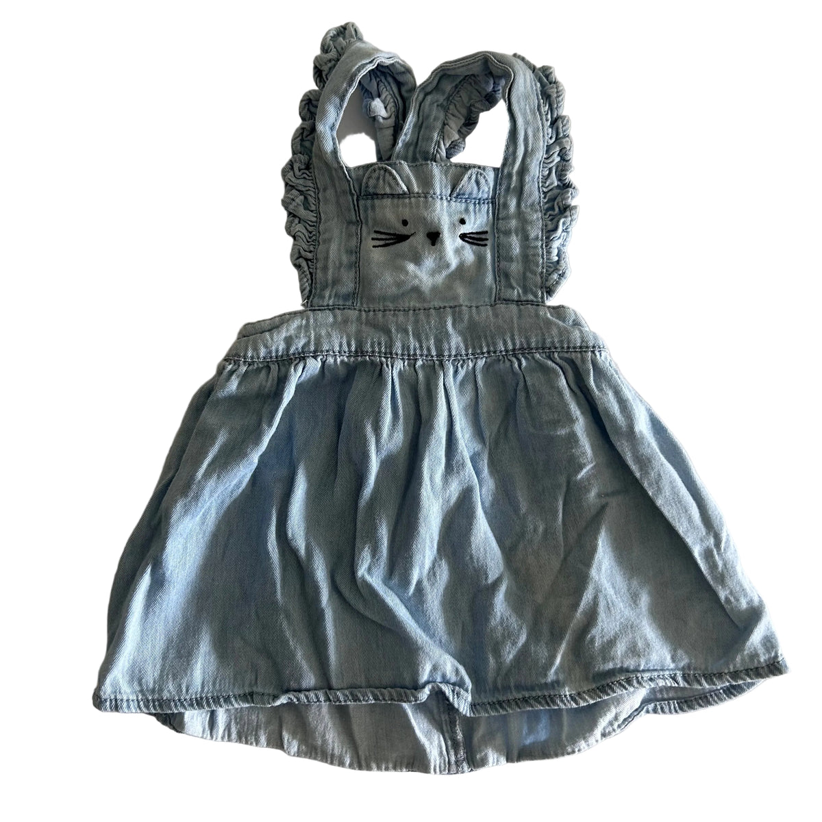 Cotton On Age 0 sleeveless pinafore dress in light blue with bunny/cat face embroidery on bib, ruffle trim on armholes, bunny ear straps — gently loved condition.