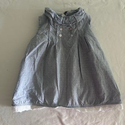 Chic Collection by Laranjinha Age 1 sleeveless dress in light blue/grey with dobby spot woven fabric, ruffle collar, mixed buttons, white lace trim hem and back opening — gently loved condition.