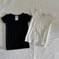 Uniqlo Age 2 short sleeved t-shirt in black & white with plain — like new condition.