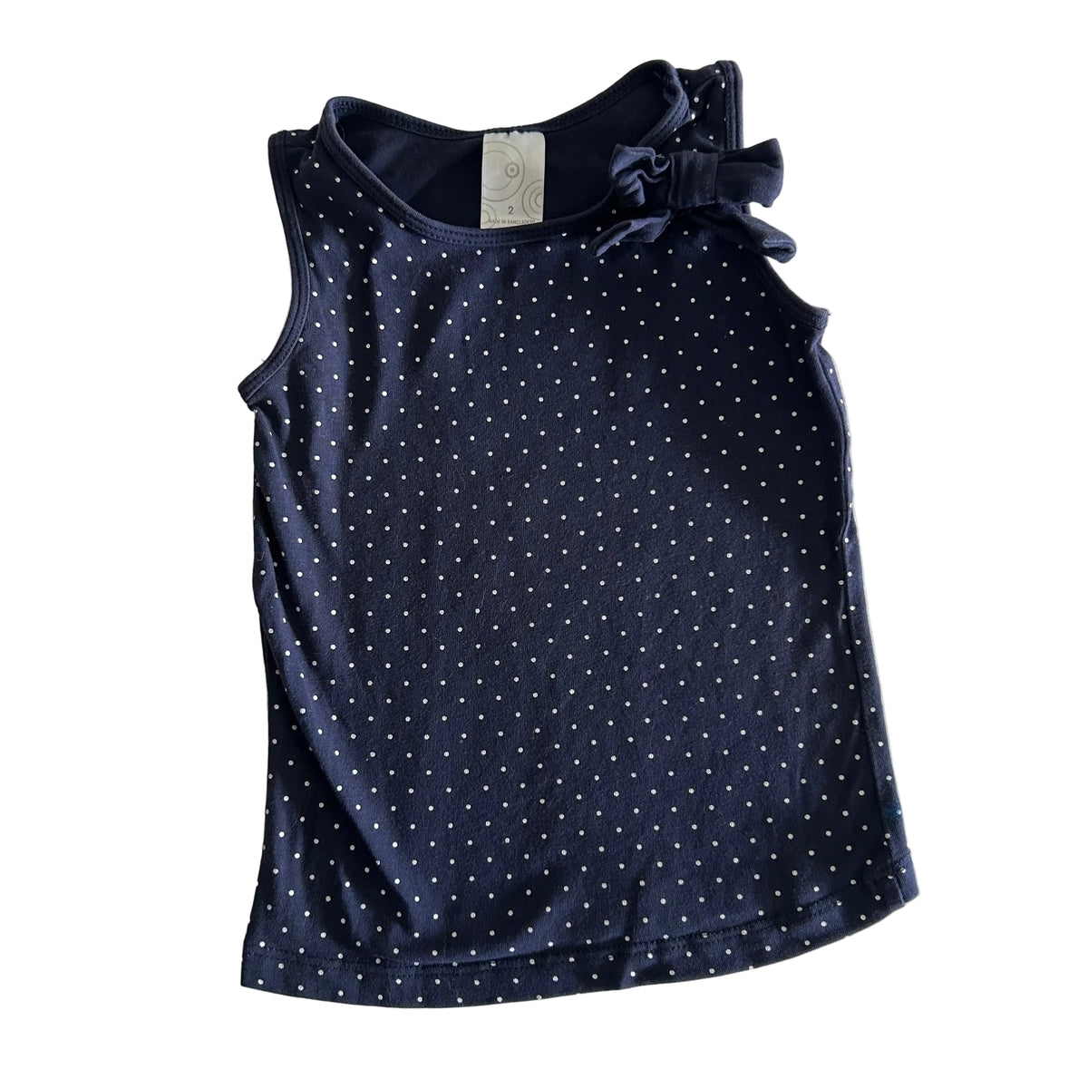 Target Age 2 sleeveless tank top with bow detail in navy blue, white with polka dot, bow embellishment at neckline — like new condition.