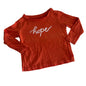 Anko Age 2 long sleeved t-shirt in orange with white cursive 'hope' text with small flower motifs — gently loved condition.