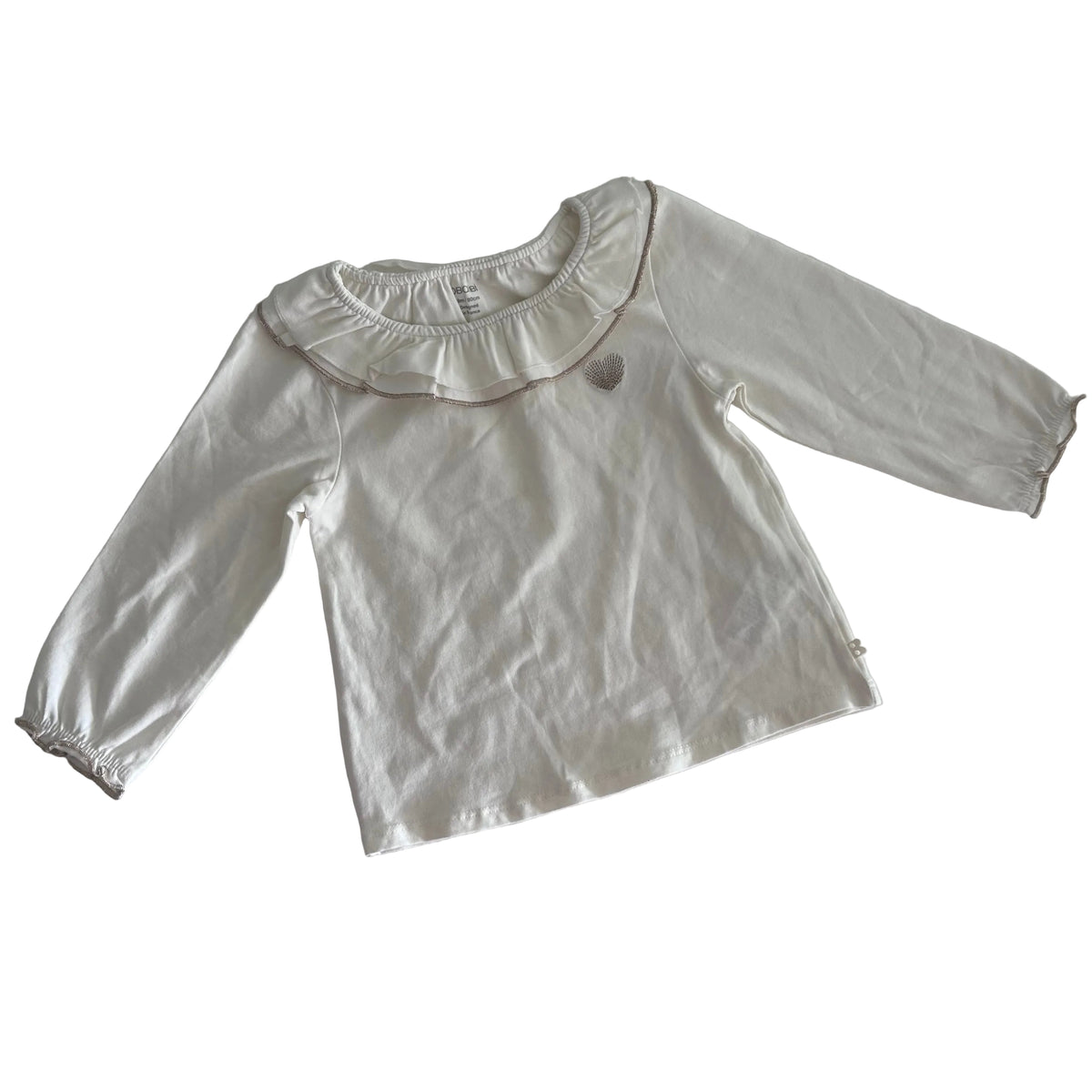 Obaïbi Age 2 long sleeved ruffle collar top in white with gold/taupe embroidery detail with ruffle collar with metallic trim and small embroidered seashell motif — like new condition.