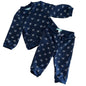 Obaïbi Age 2 two-piece tracksuit set (button-up jacket and jogger pants) in navy blue with allover small floral clusters (white, light blue, and orange flowers with blue dot centres) — like new condition.