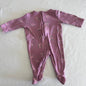 Dymples Age 00 long sleeved zip footed onesie in dusty pink with floral rose print â€” gently loved condition.
