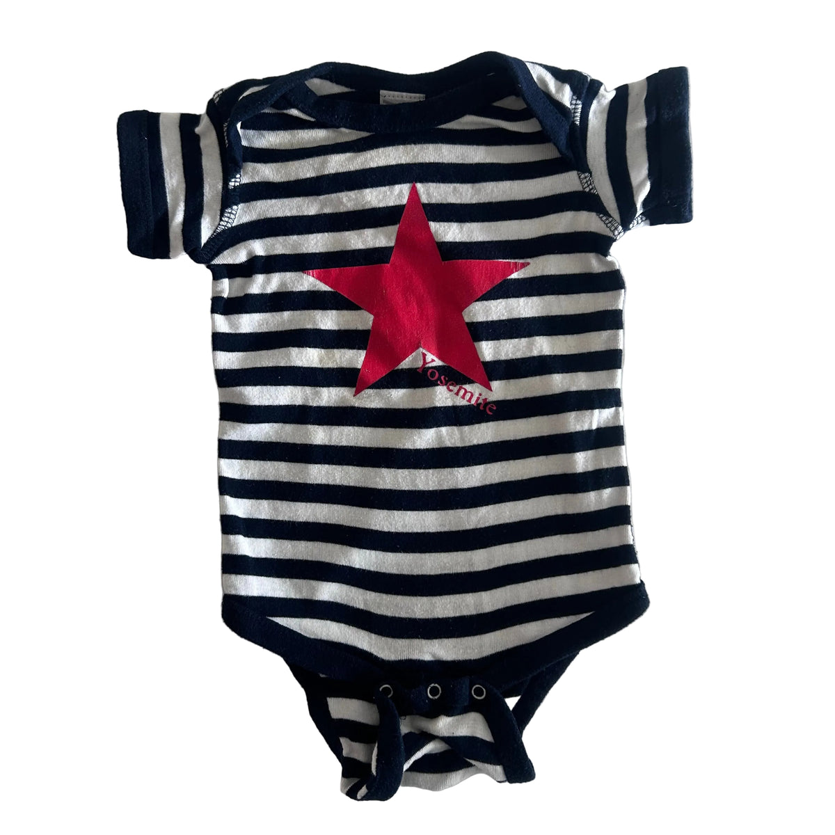 Lighthouse Apparel 00 (estimated) short sleeve bodysuit in navy, white, red with horizontal stripes with large red star graphic and 'yosemite' text — gently loved condition.