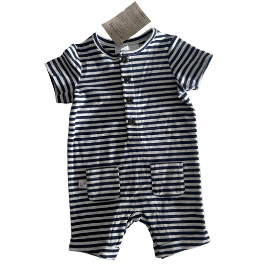 The Little White Company Age 000 short sleeve romper in navy and white with horizontal stripes, small embroidered red anchor patch on front pocket — new condition.