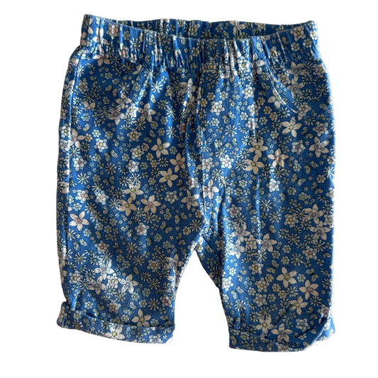 First Impressions Age 1 shorts (long) in blue, white, yellow, pink with ditsy floral print, elasticated waistband — gently loved condition.