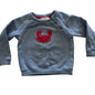 Blue-grey sweatshirt with a red crab design on a light gray background