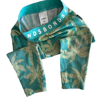 Green and yellow tropical palm tree patterned leggings with Bonds on elastic waistband and label on show