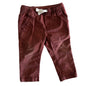 Red-brown trousers with pockets on a light background