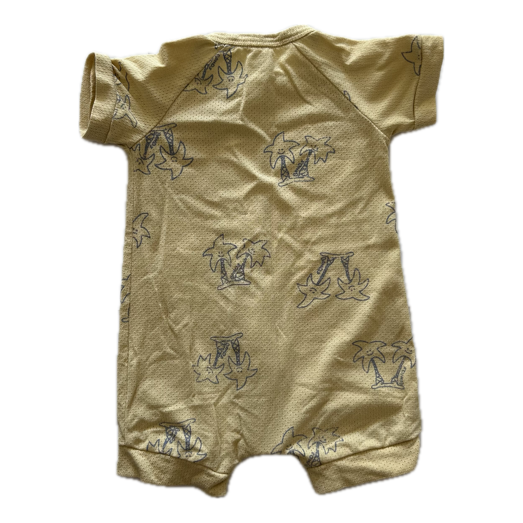Mustard yellow baby romper with short sleeves and palm tree pattern on pale background