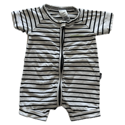 White and black stripey baby romper on pale backround