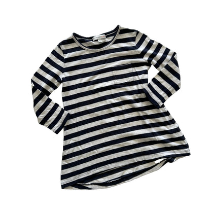A long-sleeve striped tunic top with horizontal navy and off-white stripes, laid flat on a white background.