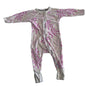 The front of a light pink baby onesie with long sleeves and legs, featuring a darker pink floral pattern, laid flat on a white surface.