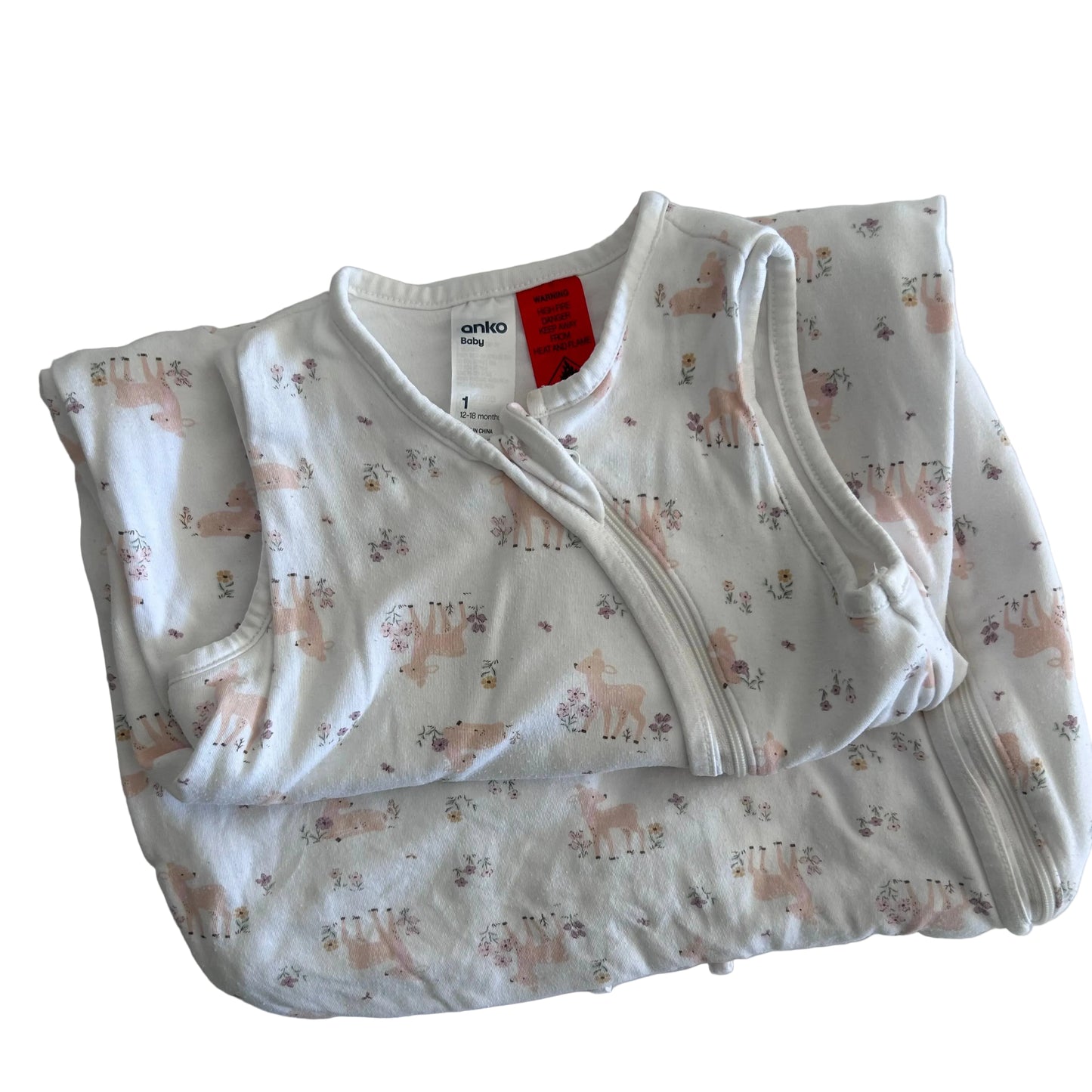 A folded white baby sleep sack with a light pink and brown deer pattern, featuring a snap closure at the collar. The brand name 'anko baby' is visible on the inner neck label.