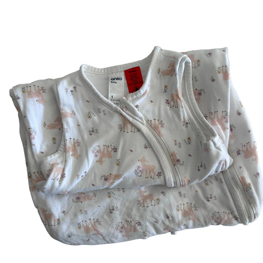 A folded white baby sleep sack with a light pink and brown deer pattern, featuring a snap closure at the collar. The brand name 'anko baby' is visible on the inner neck label.