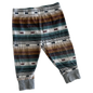 The front of pair of children's striped trousers with horizontal bands of brown, green, grey, black, and white, featuring ribbed ankle cuffs.