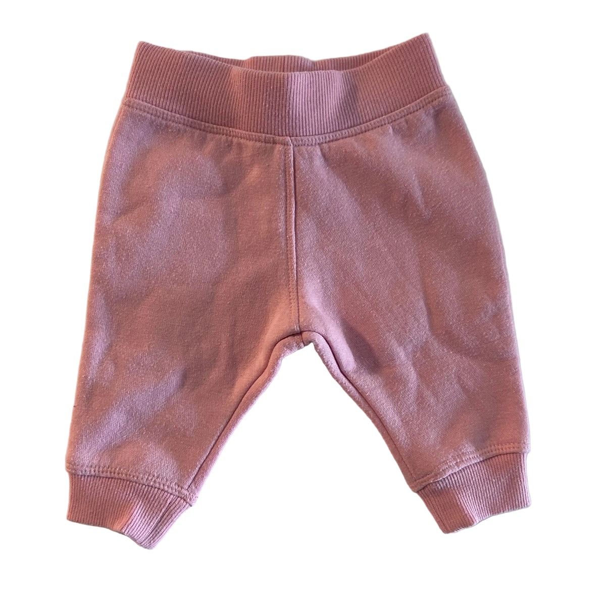 Kids & Co Age 000 trousers / baby trackpants in pink with ribbed waistband and ankle cuffs — gently loved condition.