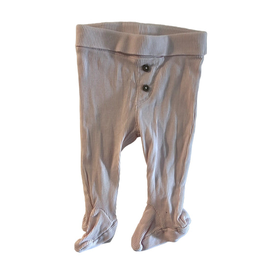 Target Age 000 trousers in pink with ribbed texture buttons, footsies, gently loved condition.