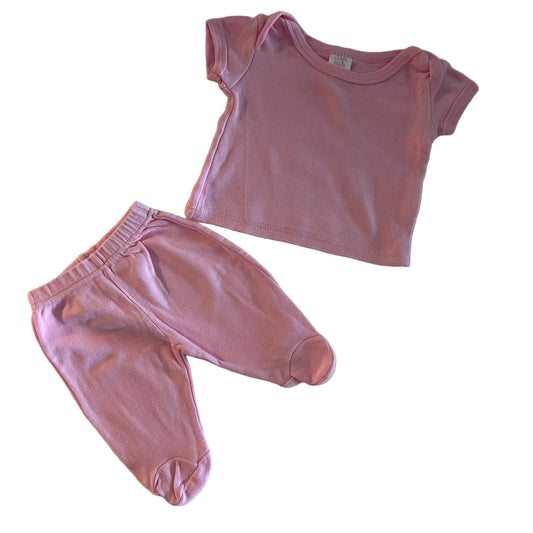 Ollie's Place Age 000 short sleeve t-shirt and footed pants set in pink with plain in gently loved condition.