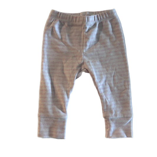 A pair of baby leggings with a fine horizontal stripe pattern in pink and white, laid flat on a white background.