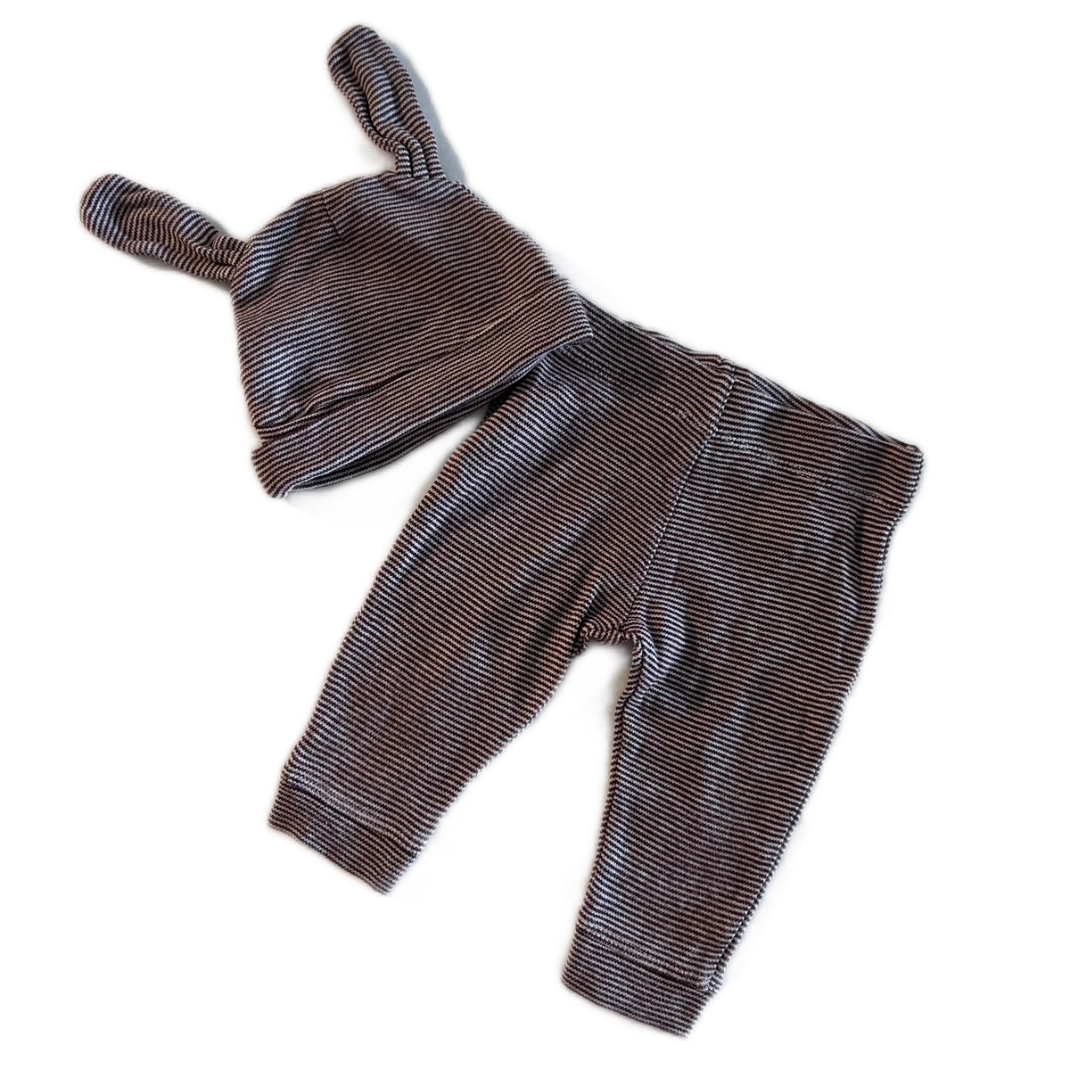 Anko Age 000 trousers in dark mauve/brown and white with fine horizontal stripes, knotted bunny ear beanie set â€” gently loved condition.