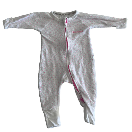 Bonds Age 000 long sleeved zip-up footed wondersuit sleepsuit in white and pink with pink dot/heart print â€” gently loved condition.