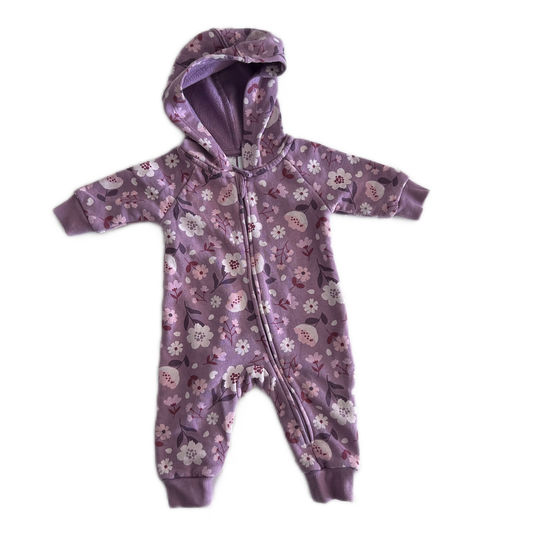 Anko Age 000 hooded zip-up baby onesie with long sleeves and cuffed ankles in purple with floral print with flowers and leaves in white, pink and dark burgundy â€” like new condition.