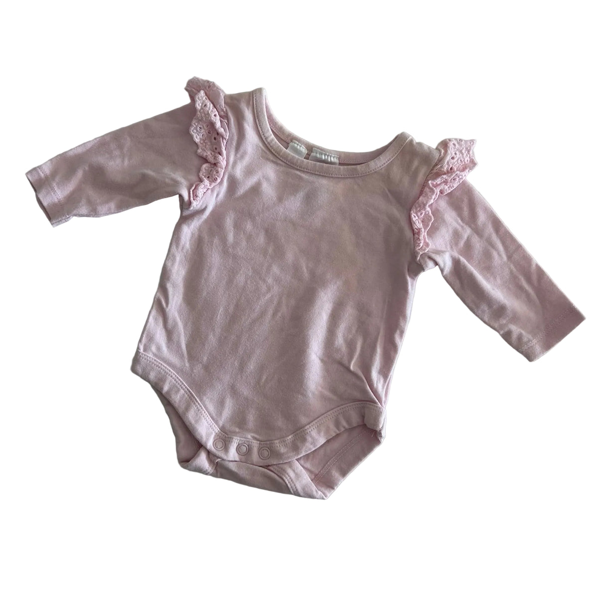 Dymples Age 000 long sleeve bodysuit in pale pink with eyelet lace frill trim at shoulders â€” gently loved condition.